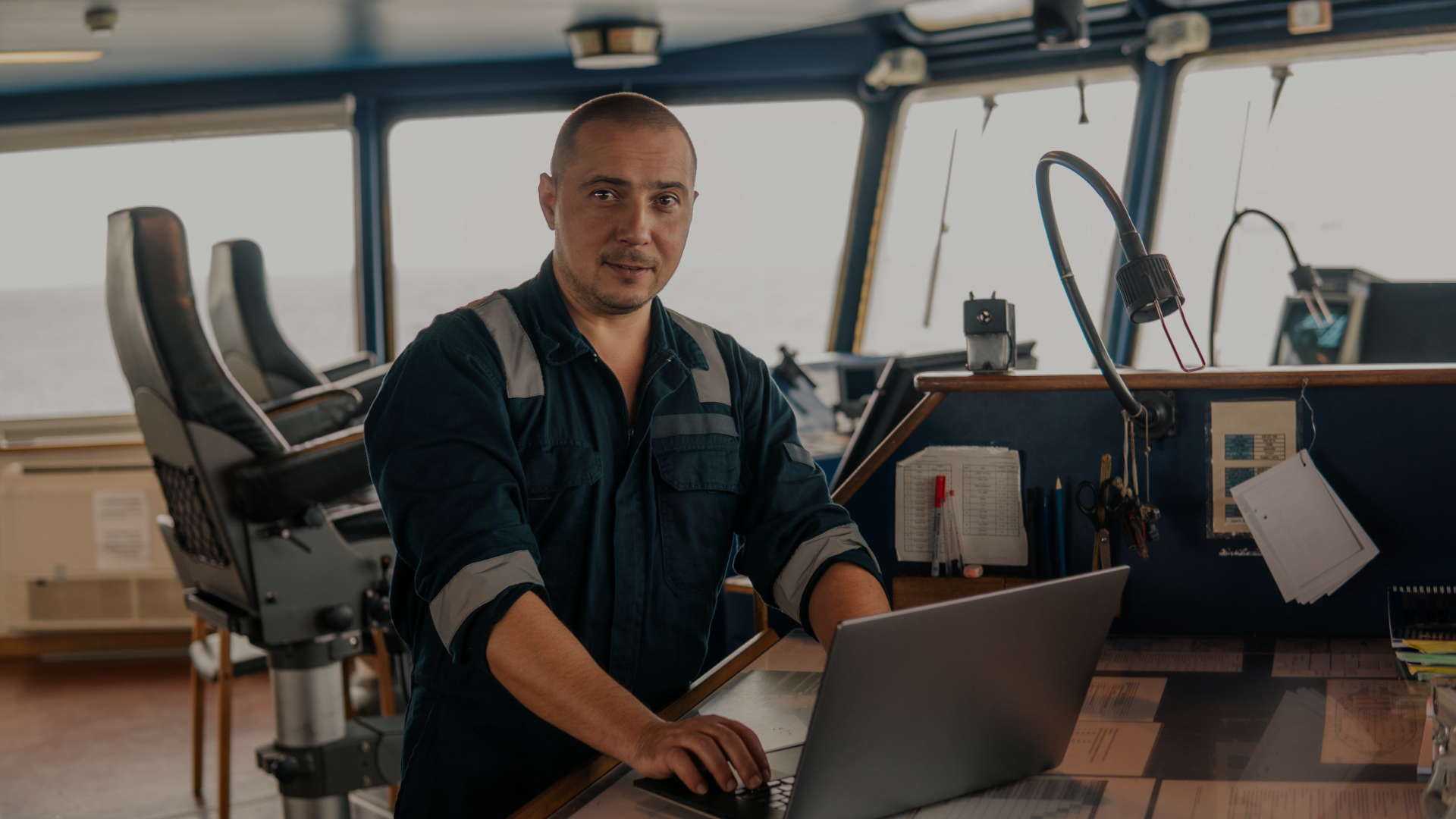 Navigation officer using laptop